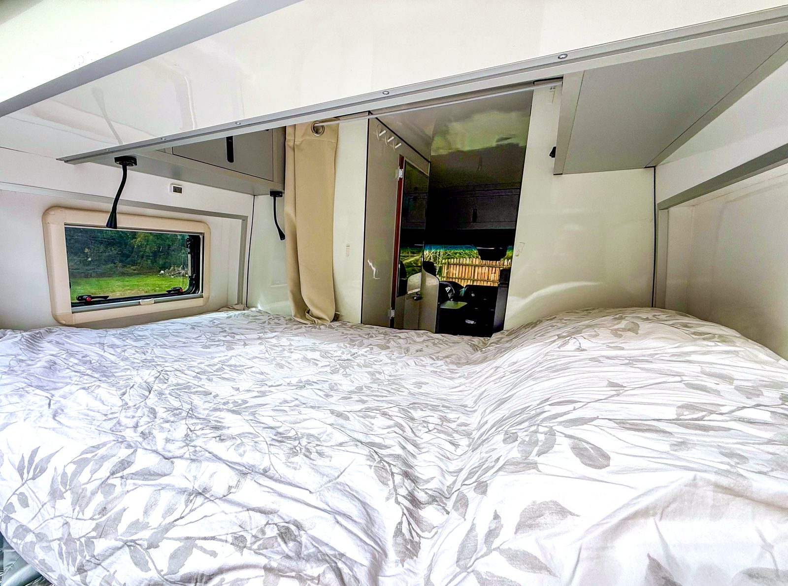 View from the bed toward the driving cab of the camper